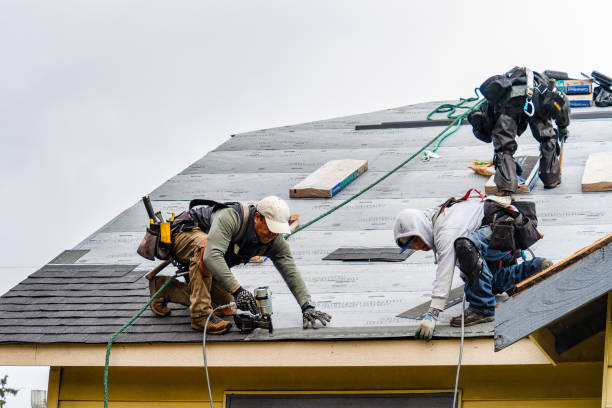 Professional Gutter Installation technician working in Justice, OK